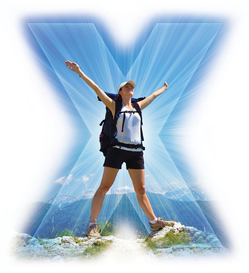 Hiker with a large X in the background